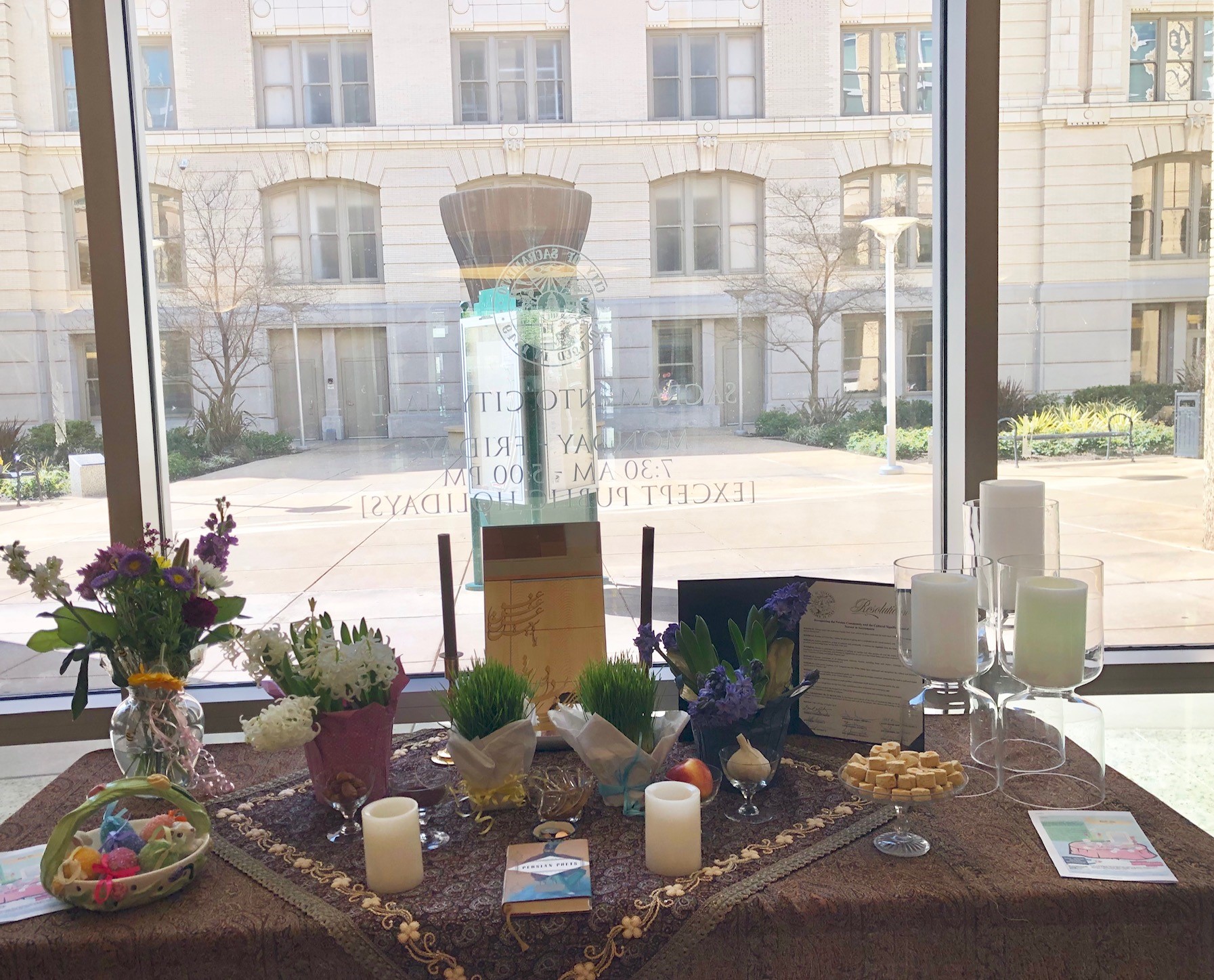 City Hall celebrates Persian holiday Norooz with a ‘haft-sin’ in lobby