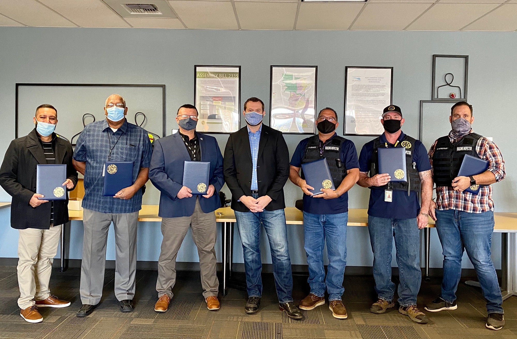 City building inspectors recognized for their work helping local businesses during protests