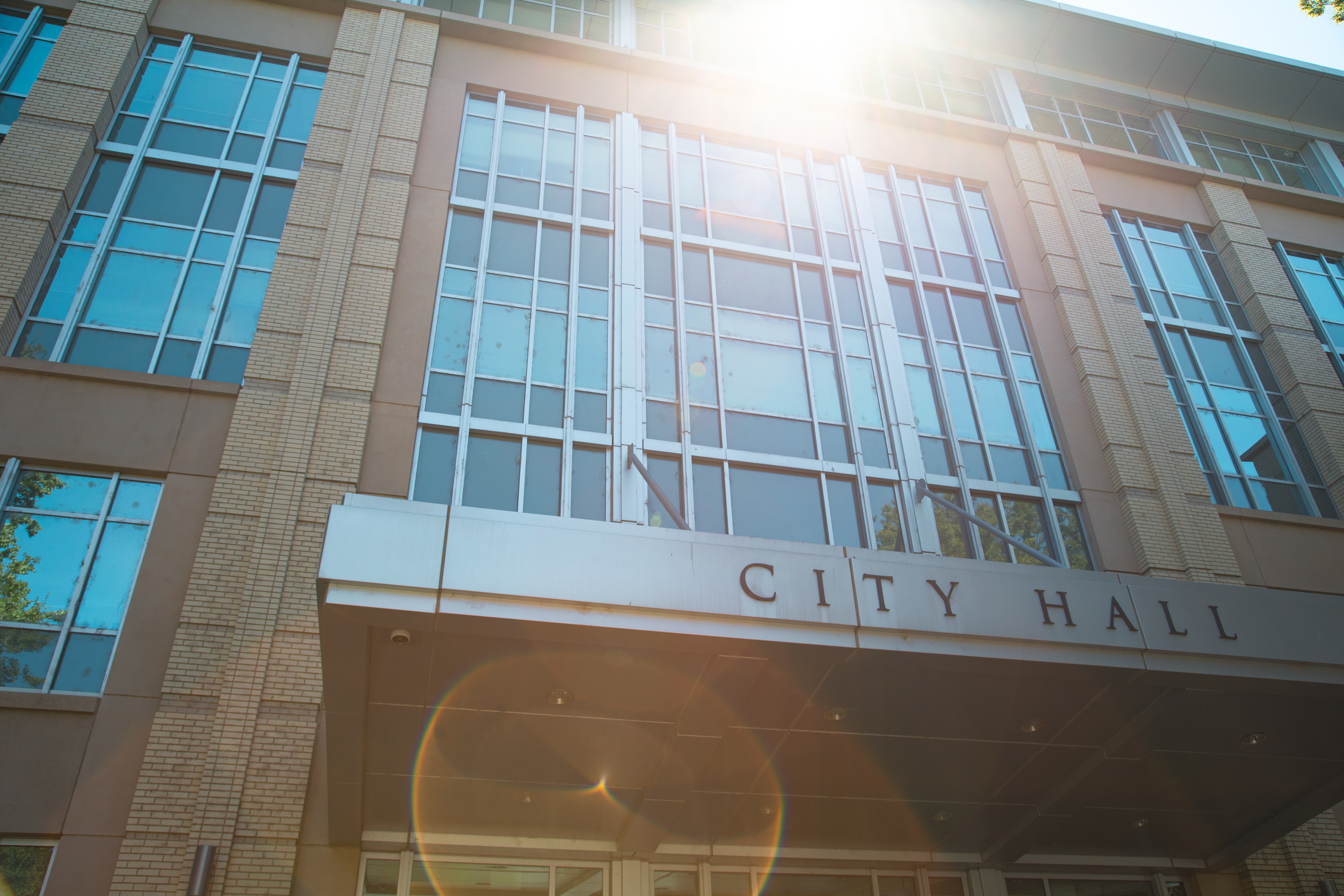 photo of city hall entrance looking up towards windows