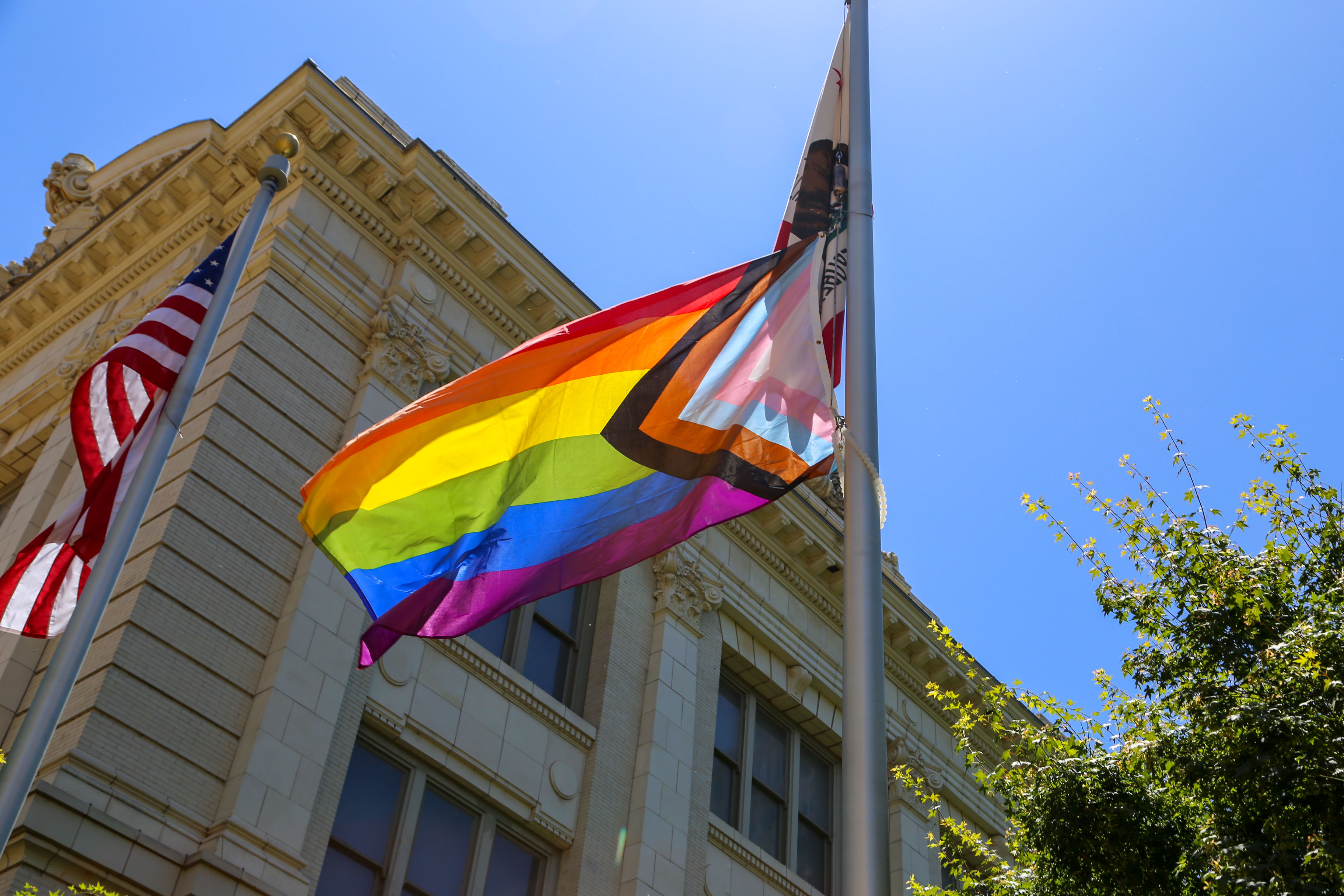 pride flag outside of the historic sacramento city hall