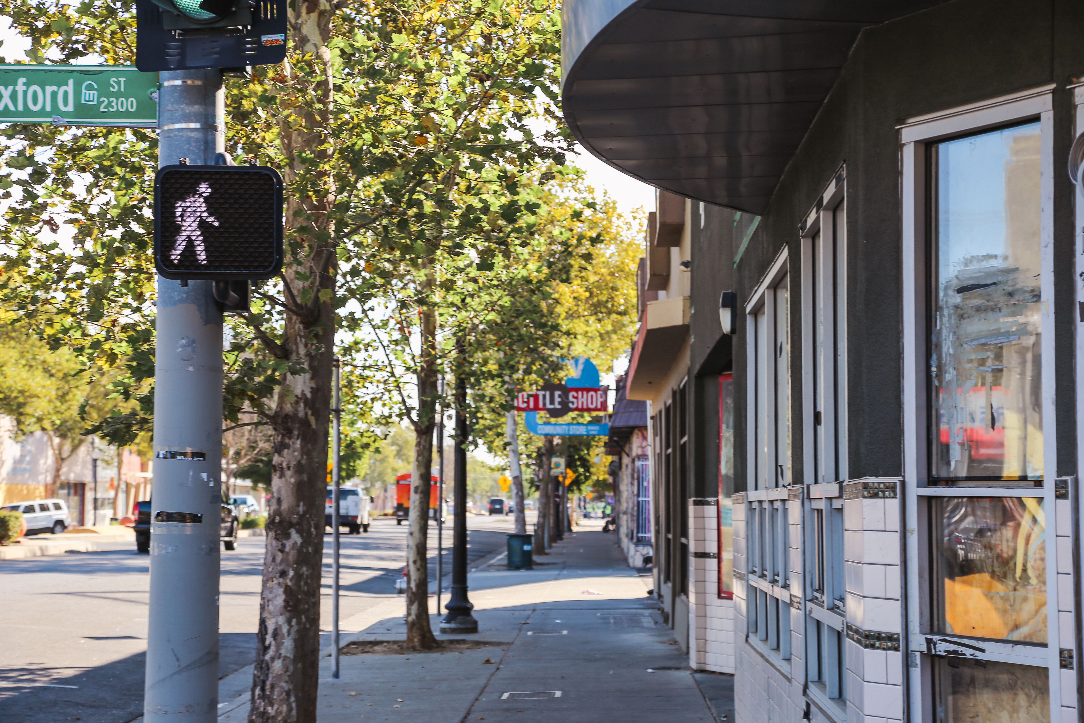 Photo of sidewalk of businesses in Del Paso neighborhood